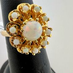 14k Yellow Gold Fiery Opal Ring. 1.50 Carats. Size 5.5. 7.7 Grams. Pt1286 Please Feel Free To Contact Me For Any Questions! Check Out My Other Listings For Louis Vuitton, Gucci, Christian Dior, Chanel, Tiffany, Free People, Anthropologie, Juicy Couture, Purses, Earrings, Rings, Bracelets, Wallets, Brooches, Pins, Charms, Watches, Sunglasses, Bags, Shoes. New To Poshmark? Use Code Apictureframe To Sign Up, And Receive $10 Off Of Your 1st Order. Classic White Multi-stone Cluster Ring, White Cluster Ring Stamped 14k, 14k Gold Opal Ring Hallmarked, Exquisite Multi-stone Opal Ring For Formal Occasions, Formal 14k Gold Opal Ring, Classic Multi-stone Opal Ring For Formal Occasions, Exquisite Yellow Gold Opal Ring For Anniversary, Exquisite Yellow Gold Opal Anniversary Ring, Formal Yellow Gold Round Opal Ring