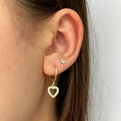 Sparkly and chic, you'll fall in love with these heart huggies at first sight.  - 925 sterling silver charm and hoop, plated with 18k gold  - Outer hoop diameter: 12 mm  - Inner hoop diameter: 10 mm  - Charm height: 9 mm  - Charm width: 8 mm Also available in silver: https://www.etsy.com/ca/LittleGoldLuxe/listing/1041539467/heart-earrings-heart-huggies-925?utm_source=Copy&utm_medium=ListingManager&utm_campaign=Share&utm_term=so.lmsm&share_time=1624571976420 Also available as a necklace: https:// White Gold Huggie Jewelry For Valentine's Day, Dainty Heart Cut Hypoallergenic Jewelry, Dainty Hypoallergenic Heart Cut Jewelry, Valentine's Day White Gold Huggie Jewelry, Gold-plated Silver Heart Earrings Tarnish Resistant, Tarnish Resistant Heart Huggie Earrings, Sterling Silver Huggie Heart Earring, Sterling Silver Heart Earrings Tarnish Resistant For Everyday, Sterling Silver Huggie Heart Single Earring