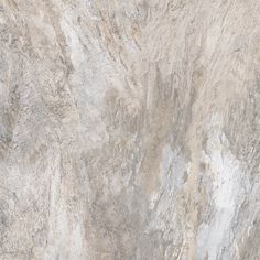 a close up view of a marble floor with grey and white colors on it's surface