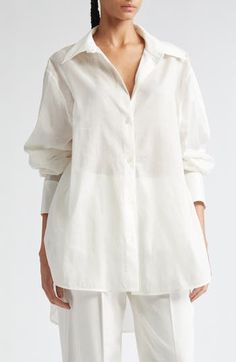 Wide-cut sleeves and a diaphanous cotton blend bring the Swedish label's signature sophistication to a wardrobe-essential button-up. 29 1/2" front length; 34" back length (size 6US/38EU) Front button closure Point collar Long sleeves with button cuffs Curved hem 50% organic cotton, 50% lyocell Dry clean or hand wash, line dry Imported Designer Clothing Summer Wardrobe Essentials, Sports Blazer, Made Clothing, Pant Shirt, Wide Sleeves, Comfortable Dress, Toddler Girl Outfits, Swimsuit Tops, Sleeve Cotton