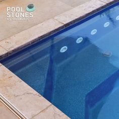 A closeup image of a swimming pool corner dislaying the beauty and elegance of the natural stone pool coping Stone Pool Coping, Swimming Pool