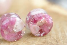 Raw Pink Tourmaline and Pink Opal Resin Plugs - Ear Gauges with 925 Silver Flakes I love to borrow rich seemingly chaotic forms and colors from the natural world, pieces of micro habitat, the world in miniature, the little reminders of our true place Nature is always amazing, brings us brightness and good vibrations, reconnects us with earth energies. Ear Plugs come in sizes 10mm to 50mm choose your size from drop down menu Make sure you have selected PAIR if you are buying two ear plugs, SINGLE Pink Stone Earrings Gift, Pink Stone Earrings For Gift, Opal Resin, Wedding Plugs, Raw Pink Tourmaline, Stone Plugs, Amber Resin, Handmade Packaging, Crystal Resin