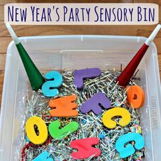 new year's party sensory bin with pins and letters