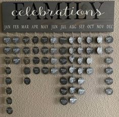 a sign that says celebration hanging on the wall with lots of magnets attached to it