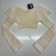 Nwt Very Cute Long Sleeve Crop Top In Ivory. Cropped Cotton Knit Sweater It Has Extra Long Sleeves It Folds Off The Shoulders For A Sexy Look. Size:4 Color: Ivory Condition: Excellent Condition 100% Cotton Luxury Long Sleeve Beige Top, Luxury Beige Long Sleeve Tops, Designer Cream Sweater For Fall, Designer Long Sleeve Beige Tops, Designer Beige Long Sleeve Tops, Luxury White Long Sleeve Sweater, Designer Beige Tops For Spring, Designer Long Sleeve Cream Tops, Luxury White Long Sleeve Tops