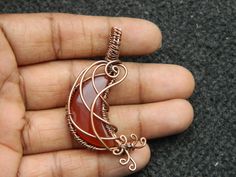 You will receive One Carnelian Moon Pendant Wire Wrapped copper pendant Gemstone Healing Jewelry Filigree Art Wire Wrap Pendant Necklace For Her Beautiful gift . Pendant Size: 43 mm long include bail. Many thanks for you visit my store ♥ if you have any question please contact us. For wholesale Price Please Convo me. You can order different items as many you like . Orange Copper Wire Jewelry As A Gift, Orange Copper Wire Jewelry For Gifts, Unique Crescent Shaped Copper Jewelry, Copper Moon Charm For Jewelry Making, Crescent Copper Jewelry As Gift, Crescent Copper Jewelry Gift, Crescent Copper Jewelry For Gift, Copper Jewelry With Moon Charm For Gift, Art Wire