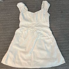 Large Hollister Summer Dress. Has A Liner To Make It Less See Through. Was Washed, But Never Worn. Can Be Worn With The Sleeves Off The Shoulder Or Caps On Your Shoulders. Casual Cream A-line Mini Dress, Casual Fitted Off-white Dress, Casual Off-white Fitted Dress, Off White Fitted Casual Dress, Casual Lined Mini Dress For Daytime, Lined Mini Dress For Daytime, Off White Sundress Mini Dress For Day Out, Daytime Mini Dress Lined, Daytime Lined Mini Dress