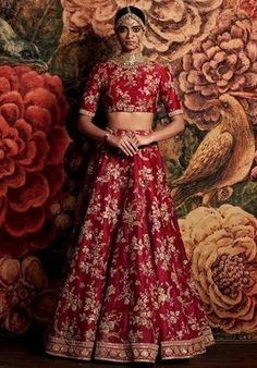 This red color bridal lehenga Sabyasachi gown is featured in the dupion silk is available on a discounted price for a limited period. Sabyasachi Bridal Red, Sabyasachi Lehenga Bridal, Sabyasachi Collection, Sabyasachi Bridal, Bridal Lehenga Collection, Designer Bridal Lehenga, Indian Bridal Lehenga, Bridal Lehenga Red, Red Lehenga