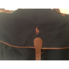 Polo Ralph Lauren Duffel Bag Large Canvas Blue Brown Carry On/ Overnight Bag. Condition Is Pre-Owned. Shipped With Usps Mail. Blue Shoulder Bag For Travel With Dust Bag, Navy Travel Shoulder Bag With Leather Trim, Navy Shoulder Bag With Leather Trim For Travel, Elegant Navy Travel Bags, Blue Tote Bags With Leather Trim, Navy Shoulder Bag With Dust Bag For Travel, Luxury Navy Bags With Adjustable Strap, Designer Blue Shoulder Bag With Leather Trim, Classic Blue Bag With Leather Trim