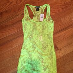 Neon Yellow Lace Racerback Tank Top. New With Tags. From Wet Seal. Size Extra Small Yellow Lace, Wet Seal, Neon Yellow, Racerback Tank Top, Racerback Tank, Music Video, Tank Top, Neon, Womens Tops