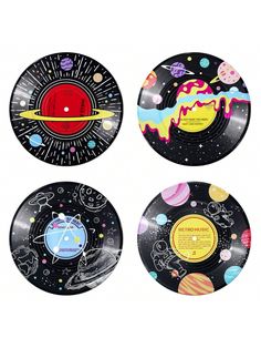 three plates with different designs on them, one has planets and the other has saturn