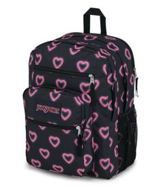 Go big with the Big Student backpack. Two large main compartments offer ample storage for your supplies, a dedicated laptop sleeve helps keep your electronics safe, and zippered utility pockets keep all of your gear organized. Big has never looked so cool. Jansport Pink Backpack, Cute Backpacks For Highschool, Cute Jansport Backpacks, Cute Bookbags, Pink Jansport Backpack, Backpacks For High School, Black Bookbag, Black Jansport Backpacks, Black Jansport