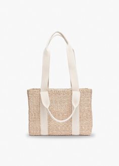 Carry it by the top handles for a classic look, or sling it over your shoulder. Our Mini Cherry tote is the ultimate in style and practicality. Handcrafted from all-natural straw. Features dual cotton handles. Measures 10.5” W x 8” H x 4” D with a 6.5"/11” handle drop. White Straw Bag With Top Carry Handle For Vacation, Casual Beige Straw Bag With Rolled Handles, White Straw Bag With Top Handle, White Straw Bag With Top Carry Handle, Cream Rectangular Shoulder Bag With Rolled Handles, Beige Basket Bag With Top Carry Handle, Beige Basket Shoulder Bag With Top Carry Handle, Beige Basket Straw Bag With Top Carry Handle, Neutral Rectangular Straw Bag With Handles