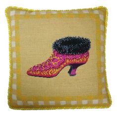 a cushion with a shoe on it