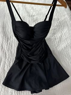 Venus St. Tropez Swim Dress Black Size 8 This elegant swim dress is ready for its moment in the sun, and it's deserving considering how unbelievably flattering it is. Its little secret: a control lining that offers mid-level shaping support. With a sweetheart neckline, ruched middle and feminine skirt that provides flirty coverage, this one-piece will easily become your new fave. Control lining Adjustable straps Molded cups Full coverage skirt Domestic or import of quality nylon/spandex tricot Only worn a few times, in lovely condition with no tears or pulls. From a smoke free home and washed in delicate detergent and ready to wear :) This item is still for sale on the Venus web site for $59.90 with out tax or shipping costs. I love it but it a little to tight in the top for me. I do have Feminine Skirt, St Tropez, Swim Dress, Women Swimsuits, Sweetheart Neckline, Dress Black, Adjustable Straps, Ready To Wear, Bathing Beauties