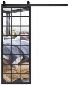 an open glass door leading to a bedroom with a bed in the corner and a window behind it