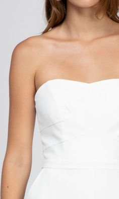 [ details ] Strapless On-seam pockets Fabric: 100% Polyester [ size and fit : based on size S ] Across chest: 16" Across hip: 19 1/2" Inseam: 27“ We recommend taking your regular size Model is 5'8" and is wearing a size Small. From a bottomless mimosa brunch with the ladies to a night out with the boo, this form-fitted halter jumpsuit will take you places in style. Wear your favorite necklace and earrings, with the perfect pair of heels, and your look is complete. Mimosa Brunch, Wrap Jumpsuit, Halter Jumpsuit, Pinstripe Dress, White Jumpsuit, Front Tie Top, Tie Top, Necklace And Earrings, Slim Leg