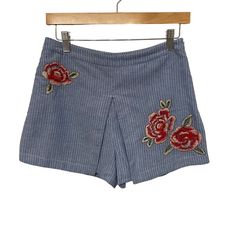 Nwt Joa Los Angeles Womenssize S Embroidered Rose Shorts Skort Blue White Striped Cotton Features: Blue With White Pinstriped Shorts With Floral Embroidery And A Skirt Peep Through Split Front High Waist, Fully Lined, Side Zipper And Hook And Eye Closure 100% Cotton Summer, Breathable The Fabric Has A Raw, Natural Feel (Please See Pictures) Hand Wash Size: Womens S Approximate Measurements Waist (Flat Lay - Across) 14 In Rise 12 In Inseam 2 In Condition: New Please Review Approximate Measurement Blue Floral Embroidered Bottoms For Summer, Blue Floral Embroidered Bottoms For Spring, Blue Floral Embroidery Bottoms For Spring, High Waist Floral Embroidered Shorts For Spring, High-waisted Shorts With Floral Embroidery For Spring, Casual Floral Embroidered Shorts, Blue Embroidered Cotton Shorts, Floral Embroidery Bottoms For Day Out, Blue Embroidered Bottoms For Summer