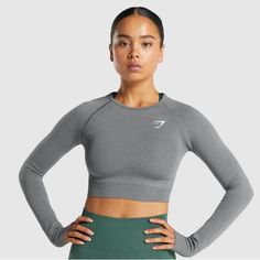 I Only Wore This Top Once So It’s Basically Brand New. Fits To Size And Comfortable I Just Didn’t Like The Way It Looked On Me :) Gymshark Cropped Long Sleeve, Gymshark Vital Seamless Long Sleeve, Gymshark Vital Seamless, Athletic Crop Top, Grey Crop Top, Gymshark Women, Seamless Leggings, Long Sleeve Crop, Grey Shirt