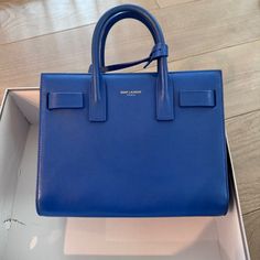 80% New, Little Scratches At Back (Near Handle), With A Bag Strap, Generally In Good Condition 22cm*18cm*10cm Designer Blue Bag For Formal Occasions, Luxury Blue Satchel With Palladium Hardware, Designer Blue Satchel Tote, Designer Blue Tote Satchel, Designer Blue Tote Bag, Classic Blue Satchel With Branded Hardware, Modern Blue Satchel With Branded Hardware, Blue Formal Satchel With Branded Hardware, Designer Blue Satchel With Detachable Strap