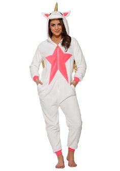 a woman in a white unicorn onesuit with pink star on the chest and ears