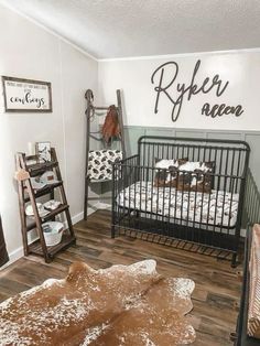 a baby's room is decorated in brown and white