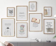 there are many framed books on the wall