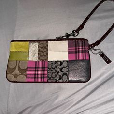 Nwot Coach Signature Colorful Patchwork Wristlet That Makes A Shoulder Bag As Well With Strap Nice Smoke Free Home Coach Multicolor Pouch Wristlet, Coach Multicolor Wristlet For Everyday, Multicolor Rectangular Wristlet With Strap, Multicolor Rectangular Wristlet With Wrist Strap, Fashion Diary, How To Make Purses, Coach Bags, Mini Bag, Pink And Green