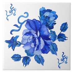 a blue and white flower is on the wall