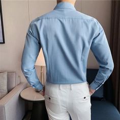 SPECIFICATIONS Material: COTTON Material: Polyester Fiber Shirts Type: Casual Shirts Applicable Scene: Office Sleeve Length(cm): Full Applicable Season: Spring and Autumn Gender: MEN Item Type: Shirts Collar: Turn-down Collar Closure Type: Single Breasted Sleeve Style: Regular Fabric Type: Broadcloth Pattern Type: Solid Blue Slim Fit Shirt For Office, Blue Slim Fit Shirt For Semi-formal Occasions, Blue Slim Fit Shirt With Casual Collar, Light Blue Slim Fit Long Sleeve Shirt, Light Blue Long Sleeve Slim Fit Shirt, Light Blue Long Sleeve Business Shirt, Light Blue Long Sleeve Solid Color Shirt, Fitted Light Blue Long Sleeve Shirt, Light Blue Fitted Long Sleeve Shirt