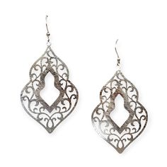 Organic shaped cutout silver tone earrings in elaborate symmetrical, geometric pattern cutouts with a matted silver plated finish. These organic shaped cutout silver tone earrings are guaranteed to get noticed, and the best part is that they are not heavy. Despite their size, these earrings are suitable for those with ears sensitive to heavy earrings Details: Organic shaped cutout silver tone earrings with hook back suitable for pierced ears. Size: Length of drop: ~ 2.8" (7 cm), width of widest Elegant Laser Cut Jewelry For Gifts, Elegant Laser Cut Jewelry As A Gift, Elegant Laser Cut Jewelry Gift, Elegant Silver Metal Plug Earrings, Metal Teardrop Filigree Earrings, Silver Metal Plug Earrings, Silver Teardrop Plug Earrings, Silver Metal Chandelier Earrings With Filigree, Elegant Silver Teardrop Plug Earrings