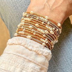 Dainty pearl stretch bracelets with freshwater and crystal pearls, and silver and gold-tone seed beads. Bridal Party Bracelets, Bracelets Dainty, Bridesmaid Pearl Bracelet, Bands Bracelets, Bridal Bracelet Pearl, Bridesmaid Pearls, Stacking Bracelets, Bracelets Gold, Beaded Wrap Bracelets