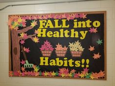 a bulletin board that says fall into healthy habitts