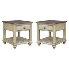 a pair of end tables with one drawer on each side and the other in between