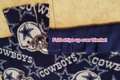 two nfl football team scarfs laying on top of each other with the words cowboys over them