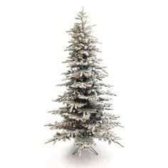 a small white christmas tree with snow on the top and branches in the bottom, against a white background