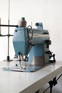 a sewing machine sitting on top of a table