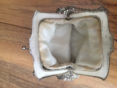 "This is a gorgeous silver mesh evening bag by Whiting & Davis in good condition. The kiss clasp is silver tone with a silver chain. It has the fabric Whiting and Davis label on the inside. This bag measures: 4\" across the top and 5 at the base 4 1/2\" long with a 8 1/2\" silver chain This is a Vintage Item meaning it has been previously owned, used and much loved! The photos are part of this items description. Thanks for your interest and viewing! Please ask for more details" Elegant Silver Evening Bag For Vintage Events, Antique Silver Rectangular Evening Bag, Silver Antique Rectangular Evening Bag, Vintage Silver Evening Bag For Events, Silver Vintage Evening Bag For Events, Silver Rectangular Coin Purse For Wedding, Vintage Silver Bag For Events, Silver Vintage Bag For Events, Antique Silver Bags For Vintage Events