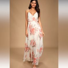 Elegantly Inclined Cream Floral Print Wrap Maxi Dress Lulus. Size Xl It Can Be Adjusted And Can Fit Size L And M White Flowy Floral Dress For Wedding, White Maxi Floral Dress For Wedding, White Maxi Length Floral Dress For Wedding, White Fitted Chiffon Floral Dress, White Chiffon Maxi Dress Feminine Style, Flowing White Maxi Dress For Bridesmaids, Flowy White Floral Chiffon Dress, Chic White Floral Dress For Wedding, Chic White Floral Wedding Dress