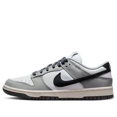 You won't want to miss out on the Nike WMNS Dunk Low Light Smoke Grey. This sneaker offers a classic, chic look that's perfect for any wardrobe. The upper is fully constructed of soft leather for long-lasting wear and an impeccable look. Decorated in a White/Light Smoke Grey/Black colorway, it features Nike's signature Swooshes and heel tabs in black while the Light Smoke Grey overlays highlight the white base perfectly. An extra touch of style comes through with the gray embroidery at the heels and white midsoles providing a striking contrast to the gray rubber outsoles. Get ready to take your street style game to the next level with these statement-making shoes. Add them to your collection today! Nike Low Dunk, Gray Embroidery, Wmns Dunk Low, Jordan Vi, Air Jordan Vi, Tenis Nike, Nike Sb Dunks Low, Nike Sb Dunks, Air Jordan 3