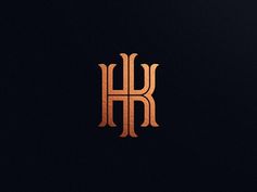 the letter h is made up of copper foil on a black background, and it appears to be in cursive font