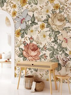 a room with floral wallpaper and two stools