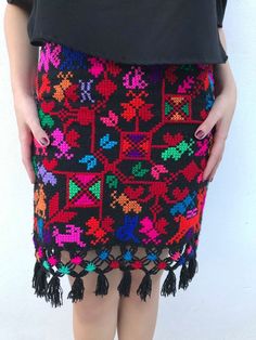 "Beautiful cross stitch hand-embroidered skirt, handwoven in a backstrap loom. Ideal to wear on cold days as it is really warm and cozy. Fits size SMALL Measurements taken flat: Waist 14 3/4\" Bottom hem width 19 1/2\" Length 23\"" Bohemian Multicolor Skirt For Fiesta, Multicolor Bohemian Skirt For Fiesta, Folk Style Embroidered Multicolor Skirt, Folk Style Multicolor Embroidered Skirt, Bohemian Multicolor Skirt With Floral Embroidery, Bohemian Fitted Skirt With Multicolor Embroidery, Multicolor Bohemian Skirt With Floral Embroidery, Bohemian Multicolor Embroidered Skirt, Floral Embroidered Festival Skirt