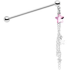 a pink and white star dangling belly ring