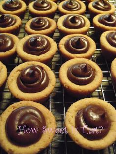 chocolate frosted cookies cooling on a wire rack with the words how sweet it is?