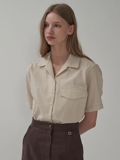 Editor's NoteThis sheer cotton shirt is lightweight, cool and crispy to the touch. The top hook can be used in various ways, such as a standard collar or an open collar.- Directed by inserting or subtracting the flap into the inner pocket- Solid sewing finish with double stitching for each line- MOTT engraved nut buttonMeasurements (in.)ONE SIZE (XS-M)- Length: 24.02 in.- Shoulder: 16.93 in.- Chest: 21.26 in.- Armhole: 11.02 in.- Sleeve: 9.65 in.- Sleeve Width: 5.71 in.*Model size: Height 5'64/Height 5'58 *The measurement standard is cross-section, and there may be errors depending on the measurement methodComposition & Care- 100% Cotton- When using a dryer or using bleach, there is a possibility of deformation, discoloration or discoloration.- To prevent deformation and discoloration Beige Collared Top For Office, Classic Neutral Cotton Blouse, Classic Cotton Blouse In Neutral Color, Beige Johnny Collar Shirt With Relaxed Fit, Classic Collared Shirt In Neutral Color, Beige Button-up Top With Placket, Beige Workwear Shirt With Placket, Summer Beige Top With Lapel Collar, Beige Shirt With Placket For Workwear