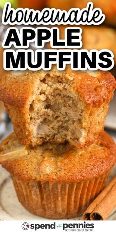 an apple muffin is cut in half and stacked on top of another muffin