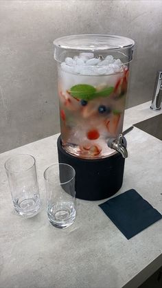 there is a drink in the ice bucket