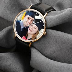 Limited to Graduates wearing Graduation Caps. Graduation is an adorable milestone of growth that deserves a unique custom watch as a gift souvenir, and this is why we offer a special price. Surprise the graduate with a custom photo watch that fits any personality and never goes out of style. The image is printed on the watch surface and lasts for good. Add your message at the back to make the watch more precious. Watch Case: Special Alloy and Glass Case Color: Silver Case Outside Diameter: 1.57 Customizable Black Watches For Gifts, Customizable Black Watch As A Gift, Customizable Black Watches As Gift, Customizable Black Watch As Gift, Personalized Watches For Gifts, Personalized Watches As Gifts, Personalized Watches With Round Dial For Gifts, Personalized Adjustable Watches As Gifts, Caps Graduation