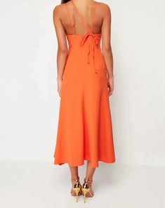 SKU:TPRSS24EL00077The product on the mannequin is size S/36/8. Fabric Type: WovenModel Front Length: 125.0 cm Party Midi Dress With Tie Back, Orange Halter Neck Dress For Brunch, Fitted Midi Dress With Tie Back, Sleeveless Orange Midi Dress For Date Night, Fitted Sleeveless Viscose Dress, Spring Midi Halter Neck Dress With Tie Back, Orange Sleeveless Midi Dress For Date Night, Orange Midi Length Dress For Brunch, Fitted Viscose Midi Dress For Summer